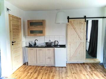 Фото номера Апартаменты Фермерские дома Bezpieczna Przystań - Apartamenty г. Uherce Mineralne 7