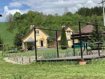 Фото номера Шале с двумя спальнями Дома для отпуска Domki nad Stawem Uherce г. Uherce Mineralne 33