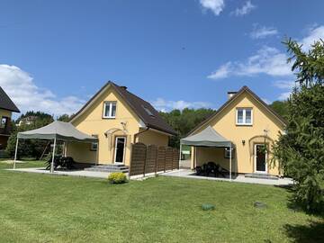 Фото номера Шале с двумя спальнями Дома для отпуска Domki nad Stawem Uherce г. Uherce Mineralne 31